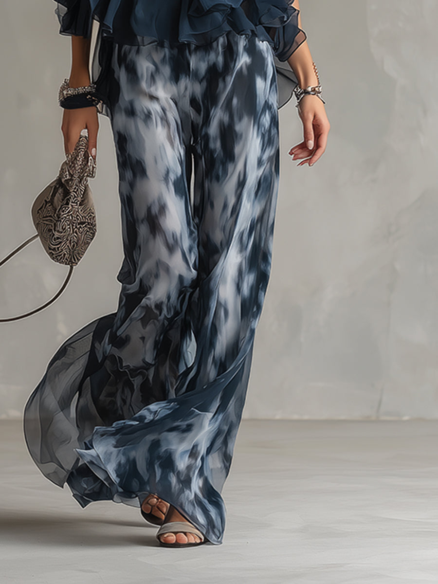 Elea | Elegante top met zwierige lijnen en wijde broek set