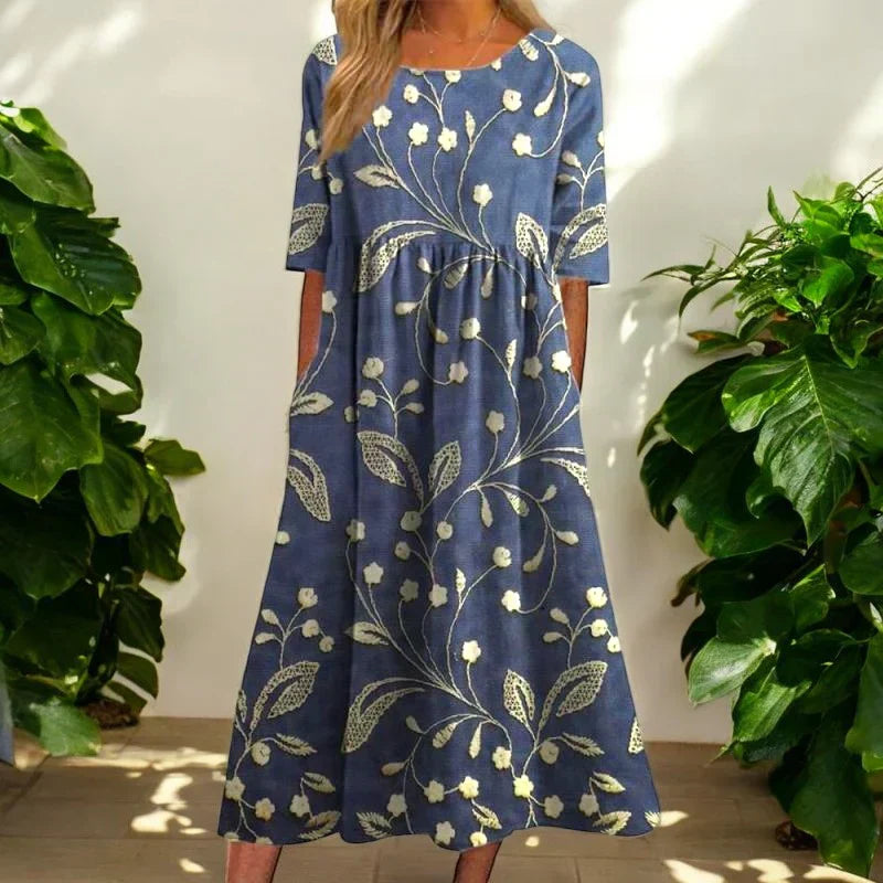 Mandy | Midi-jurk met bloemenprint en moeiteloze buikbedekking